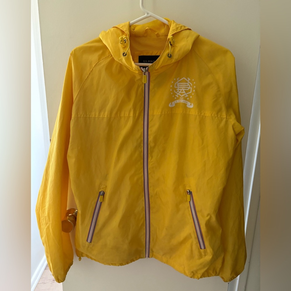 Polo Ralph Lauren yellow rain jacket . Lined and hooded zip up,  women’s size L